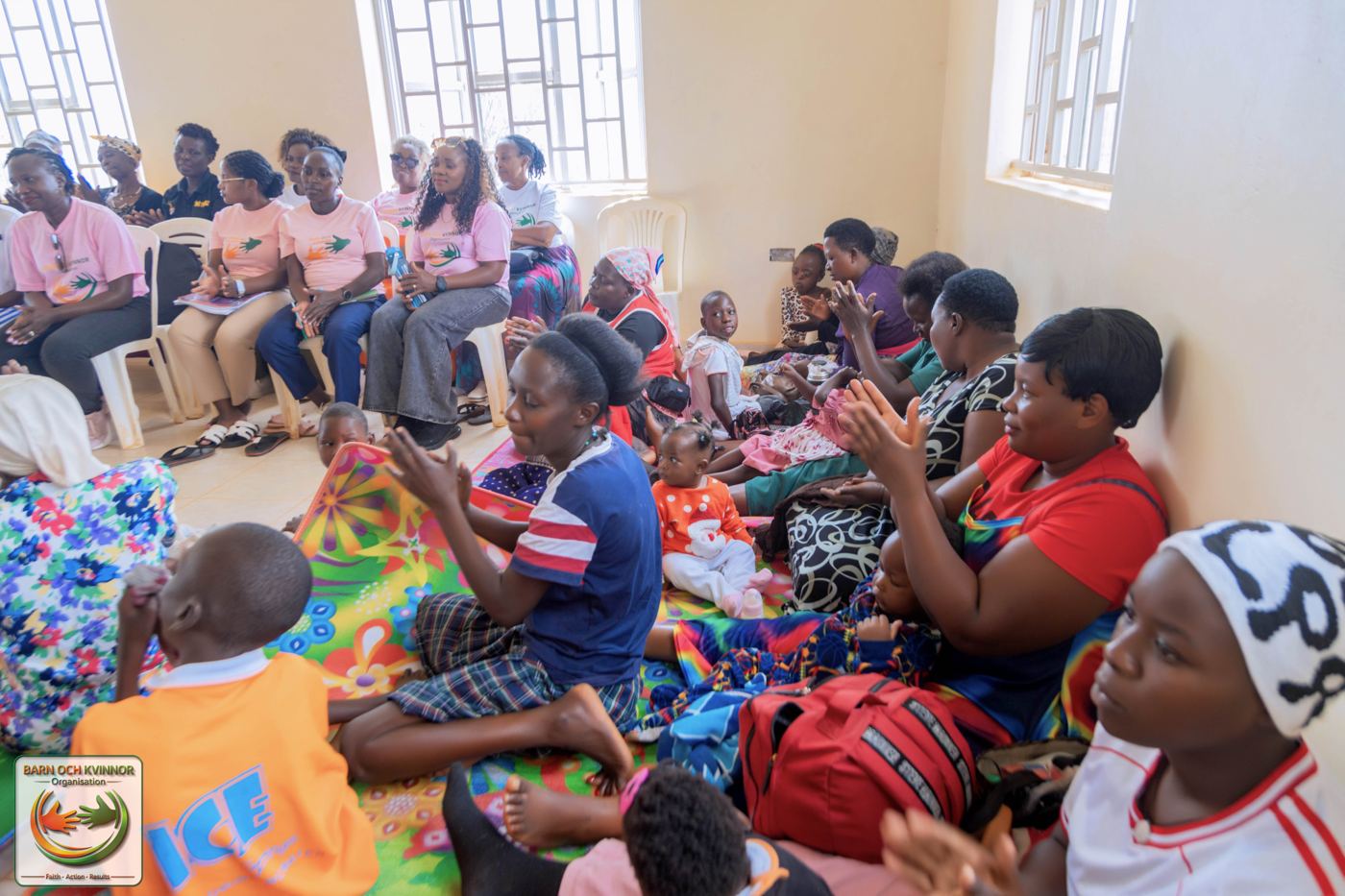 Families and children take part in an interactive community session, part of BOK's approach to building trust and shared understanding before individual support begins.