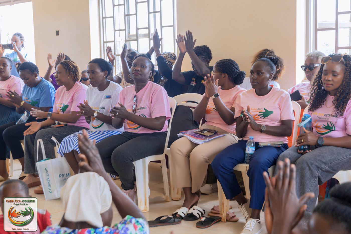 BOK Team and community members engage during a team briefing session.
