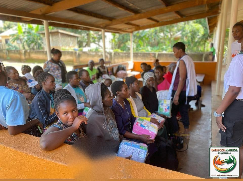 Mothers seated in the health centre waiting area