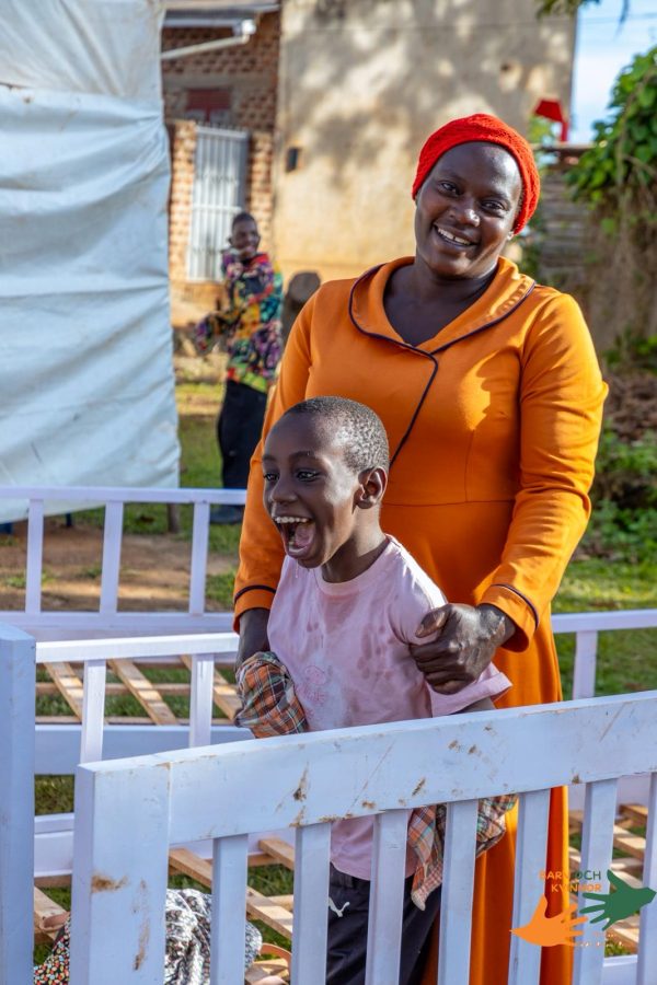 A mother and her child share a moment of joy on the day of the distribution
